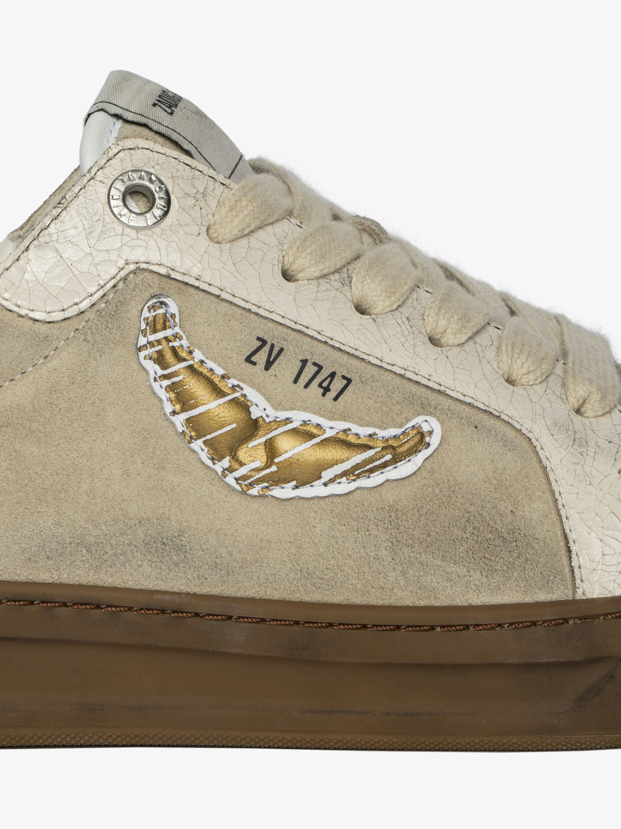 Basses Fly Wings Cracked Sneakers - Low-top sneakers in a mix of worn and cracked leather with embossed wings.